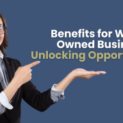 Business woman holding her hand out as if she is holding the blog title and and pointing at it with the other hand